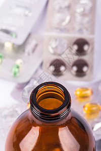 棕色药瓶药片化学黄色药品瓶子吸塑条食物胶囊化工管状背景图片