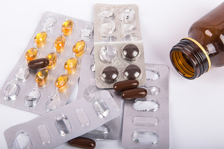 混合药瓶和药瓶胶囊棕色食物药片药品化学黄色瓶子吸塑条化工背景图片