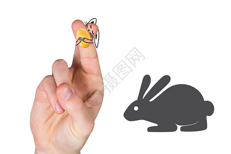 手指作为复活兔子的复合图像背景图片