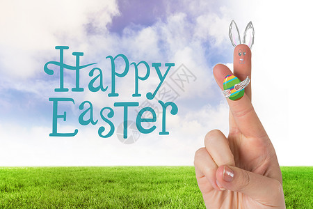 复活你快乐手指作为复活兔子的复合图像问候语蓝天农村绿色背景
