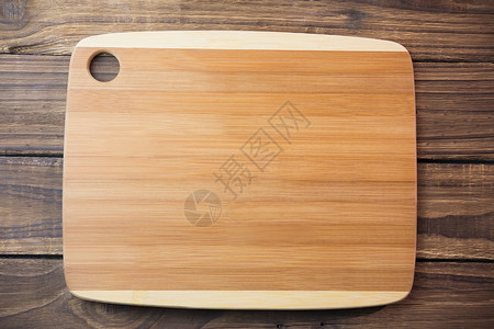 木制桌上的购物板木板烹饪切菜板厨艺美食背景图片