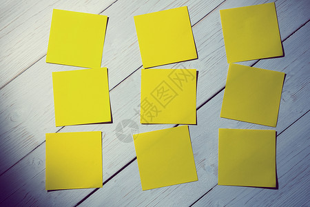 黄黄色后木头商业笔记贴纸备忘录橡木阴影桌子教育背景图片