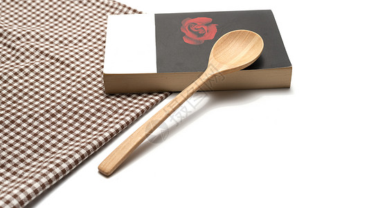 和有厨房毛巾的书汤勺木板饮食笔记木头勺子笔记本菜单桌子美食食物背景图片