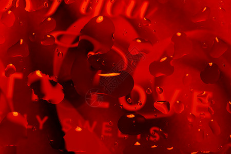 红色抽象背景与水滴气泡珠子雨滴玻璃液体艺术宏观飞沫背景图片
