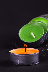 蜡烛绿色烛光影棚火焰橙子背景图片