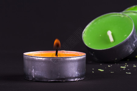 蜡烛橙子火焰烛光绿色影棚背景图片