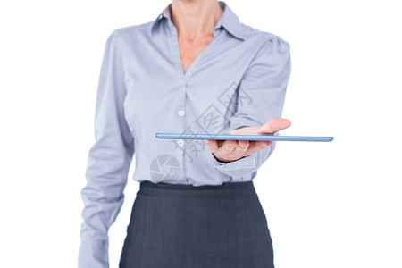 拥有数字平板的女商务人士公司滚动套装职业工作商务药片触摸屏电脑商业背景图片