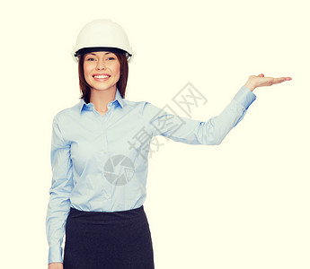 戴头盔的女商务人士握着手掌棕榈工程师女士广告雇主女性经理成人微笑建筑师背景图片
