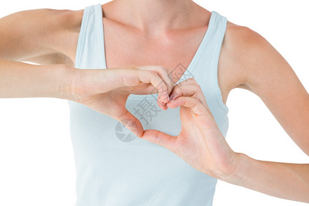 完美的女人用手做心脏形状背景图片