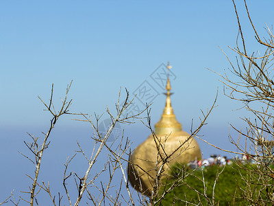 缅甸九甲寺寺佛教徒宝塔岩石宗教地标天空旅行金子百果余额背景图片