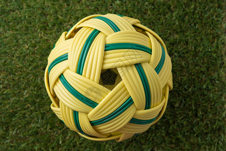 鼠球绿色运动条纹对象塑料文化藤球活动黄色柳条背景图片