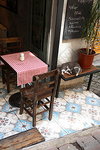 街头咖啡厅城市文化椅子商业桌布贸易街道餐厅桌子都市背景图片