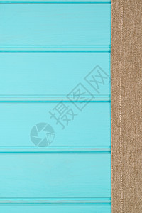 桌边的碧色和白毛巾木板格子蓝色餐厅纺织品野餐厨房木头织物毯子图片