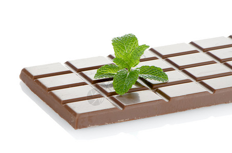 巧克力的封闭细节营养芯片薄荷小吃可可白色黑色诱惑美食棕色背景图片