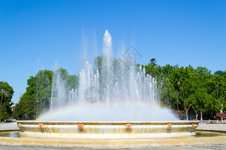 西班牙方喷泉彩虹背景图片