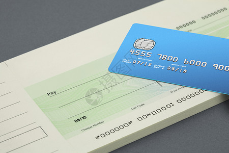 支票簿和银行卡背景图片