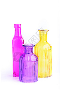 彩色瓶紫色酒精饮料蓝色白色啤酒果汁液体粉色玻璃背景图片