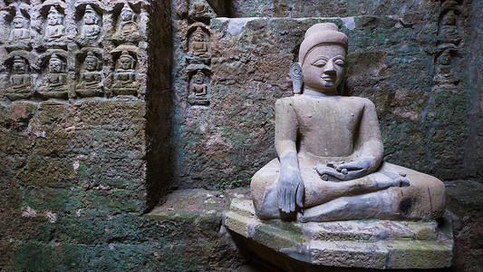 佛朗明哥缅甸Mrauk U的佛像宗教石头宽慰寺庙雕塑雕像旅游宝塔艺术背景