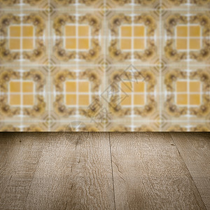 木桌顶壁和模糊的旧式瓷瓷瓷瓷砖墙广告嘲笑厨房木头桌子正方形制品架子房间陶瓷背景图片