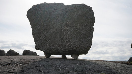 岩石上的岩石石头家庭旅行活动乐趣远足灰色背景图片