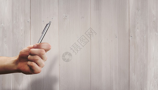 手握笔的复合图像数字击剑计算机绘图栅栏粮食地面地板背景图片