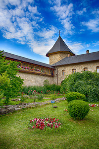 苏切维塔罗马尼亚的Sucevita油漆修道院 是教科文组织的世界遗产遗址遗产回廊地标教会文化建筑学水平农村风景背景