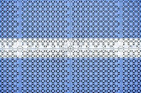 蓝塑料足球场上的白线直线背景图片
