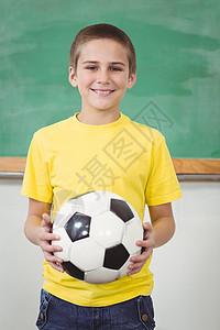 在课堂上玩足球的微笑学生人数快乐男性班级瞳孔幼儿园小学知识男生早教童年背景图片