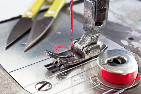 缝纫机女裁缝工作工艺接缝刺绣织物工厂制造业工业金属手动的高清图片素材