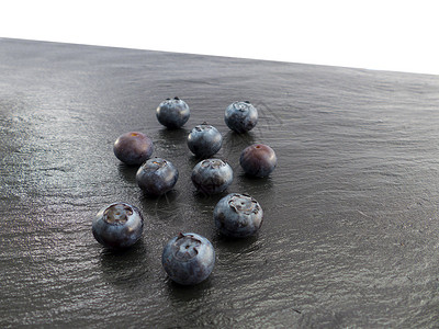蓝莓在一块板上背景图片