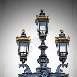 隆登灯笼和抽象光照墙中的欧洲人邮政建筑学街道城市电气活力金属力量照明安全背景图片