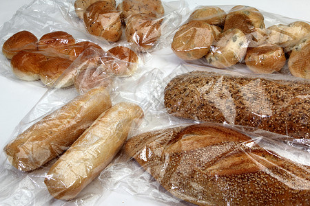面包和饼干在纤维素袋中背景图片