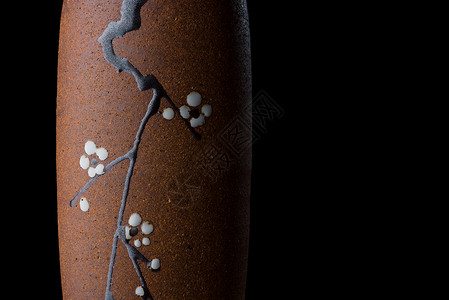黑色陶瓷花瓶樱花财团背景