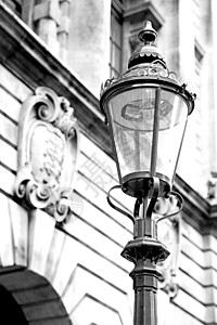 隆登灯笼和抽象光照墙中的欧洲人安全墙纸城市金属活力灯泡大理石街道电气照明背景图片