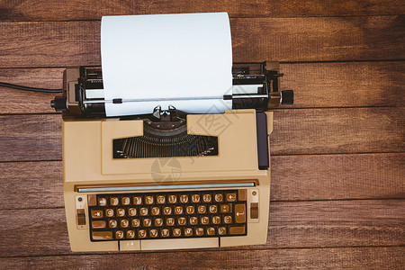 旧打字机视图书写木头打字机沟通技术键盘工具桌子职场静物背景图片