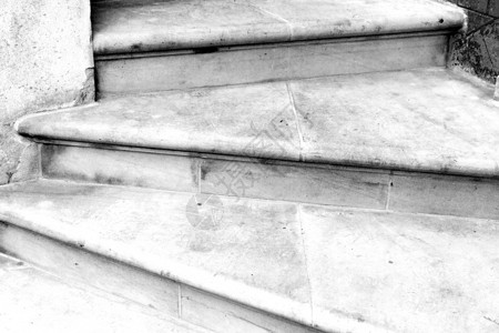 在隆登纪念碑 古老的台阶和大理石安西恩线白色空白建筑历史性废墟黑色房子石头纪念碑剧院背景图片
