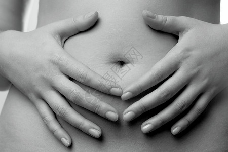 怀孕妇女辅导婴儿身体女性肚子背景图片