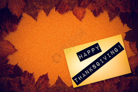 快乐感恩的复合形象橙子树叶叶子红色木头笔记桌子背景图片