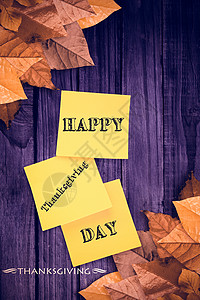 快乐感恩的复合形象红色笔记叶子木头橙子桌子树叶背景图片