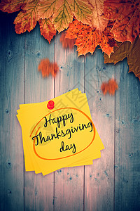 快乐感恩的复合形象橙子木头桌子红色叶子树叶笔记背景图片