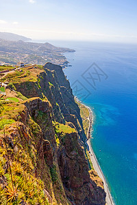 高草支撑海洋旅行地平线卡波假期悬崖高度爬坡蓝色背景图片