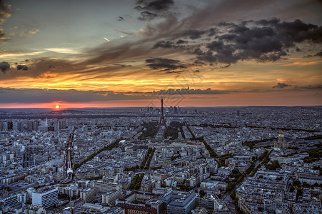 巴黎的日落天空城市景观太阳全景地标旅行风景背景图片