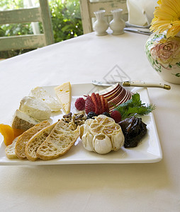 奶酪和水果板水果白色食物美食餐饮健康餐厅坚果派对面包背景图片