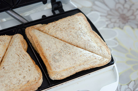 土烤面包小吃食物棕色白色脆皮早餐背景图片