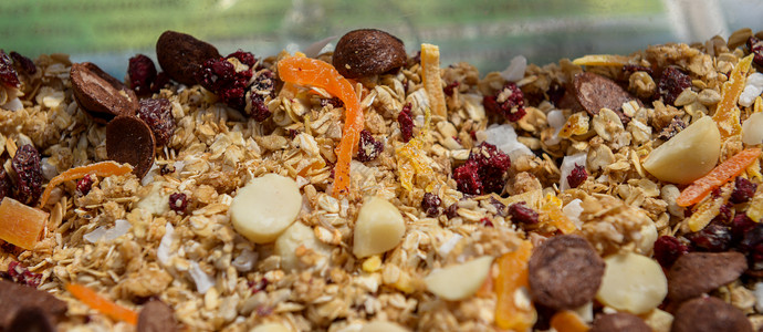 Muesli适合强者的健康饮食向日葵粮食燕麦小吃产品坚果桌子勺子谷物宏观背景图片