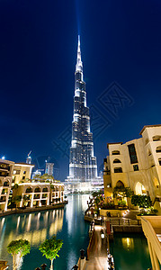杜拜夜视 迪拜世界购物中心城市旅行蓝色地标天空奢华酒店商业背景图片