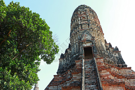 盛世启幕泰国的Ayutthaya 历史公园中的佛教寺庙艺术统治天空原住民雕像旅行建筑古董岩石石头背景