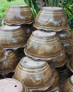 龙王 上锅倒碗花瓶手工团体石器陶瓷工艺制品持有者烧伤工作背景图片