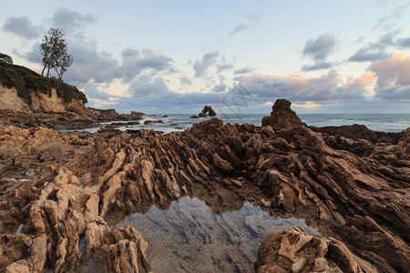 纽波特在的海滩长期接触公园日落波浪天空旅游蓝色橙子旅行支撑风景背景