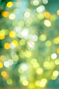 圣诞灯饰新年橙子彩灯派对圣诞绿色庆典黄色背景图片